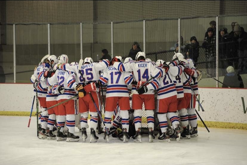 The+team+gets+together+and+prays+before+their+match.+Courteous+of+%40wphshockey