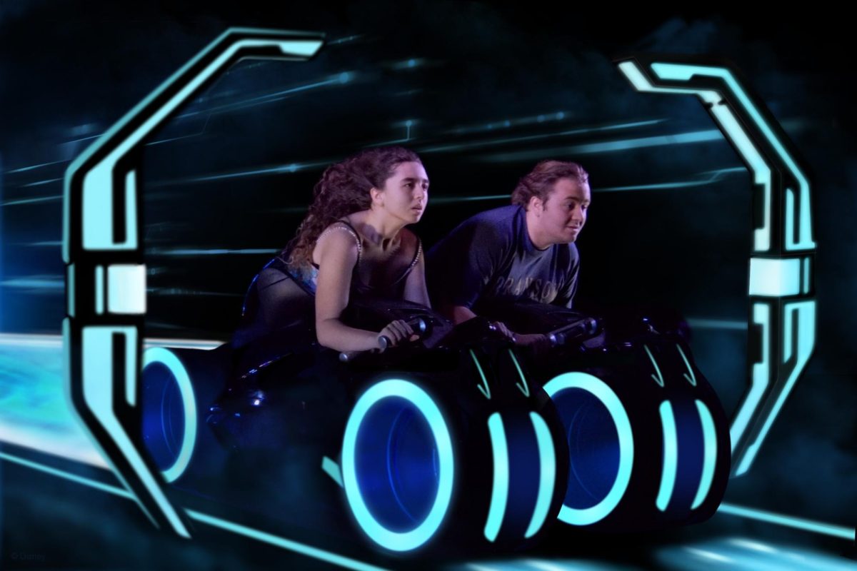 Wyatt and Taylor Andrews on the Tron Lightcycle Run ride