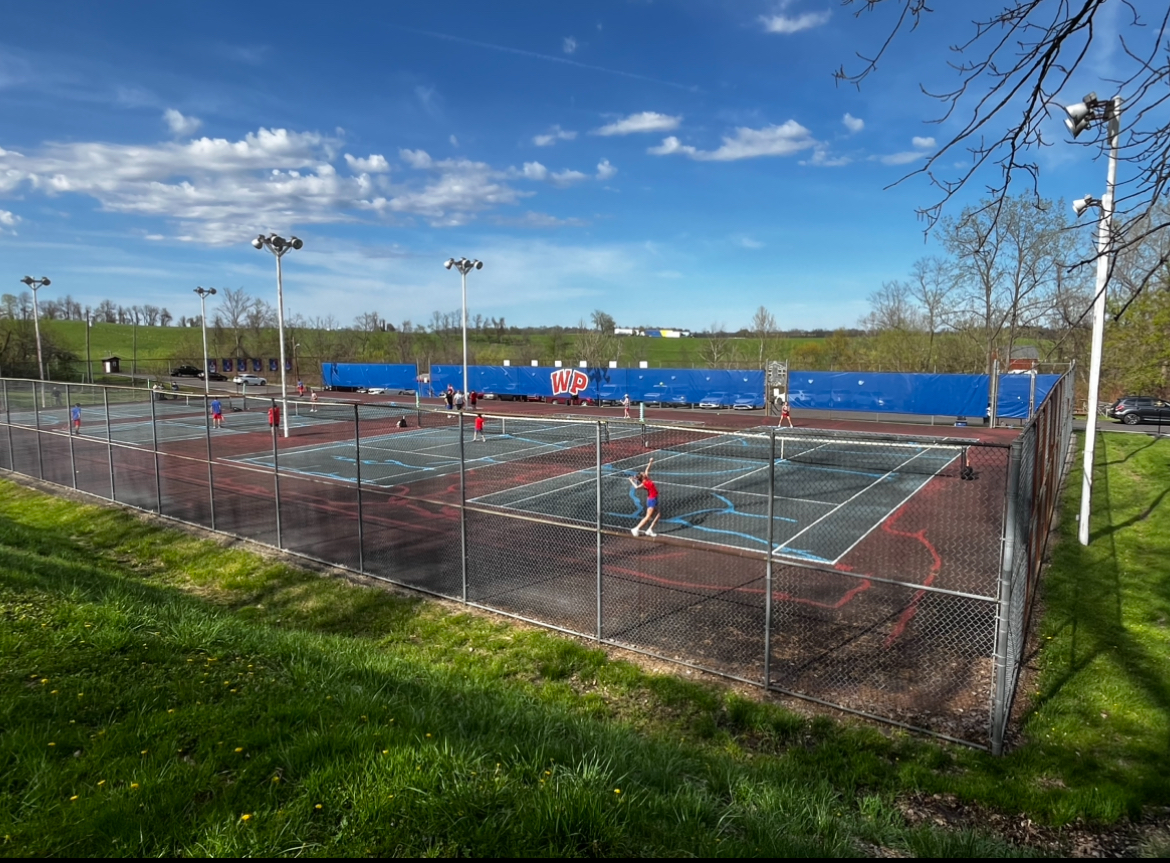 A wide shot of the Boys and Girls Tennis Teams on Tuesday, April 16th against St. Clairsville.