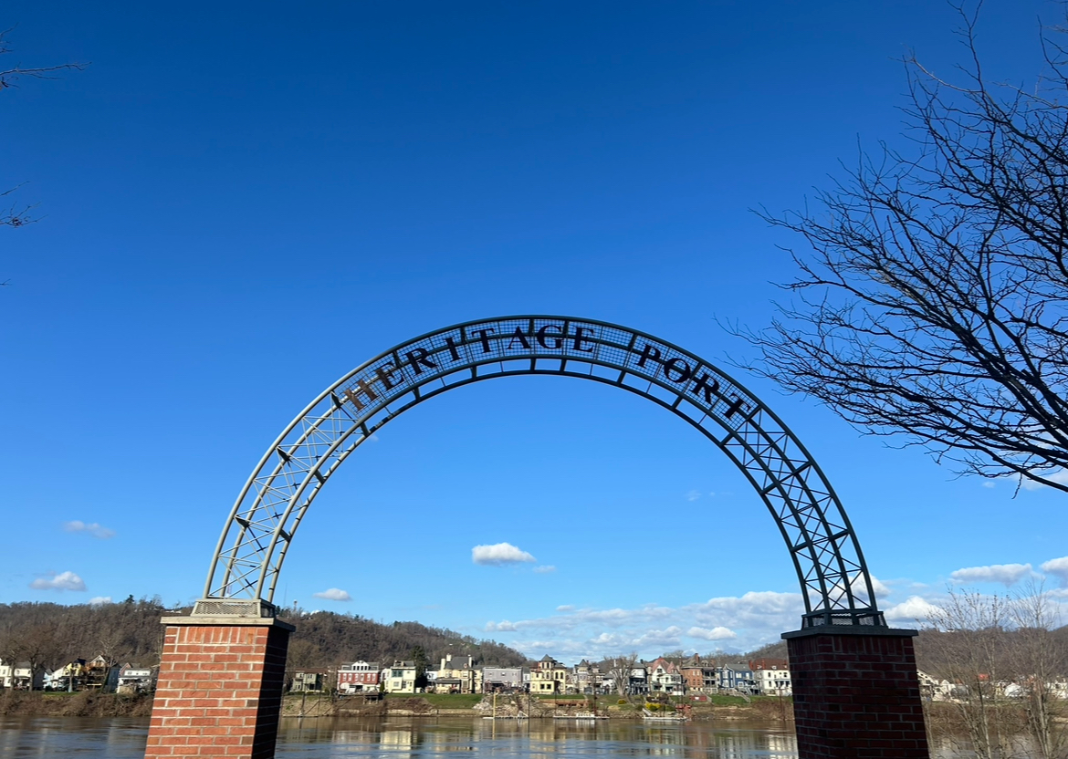 The Heritage Port archway stands firm at the bank of the Ohio river.