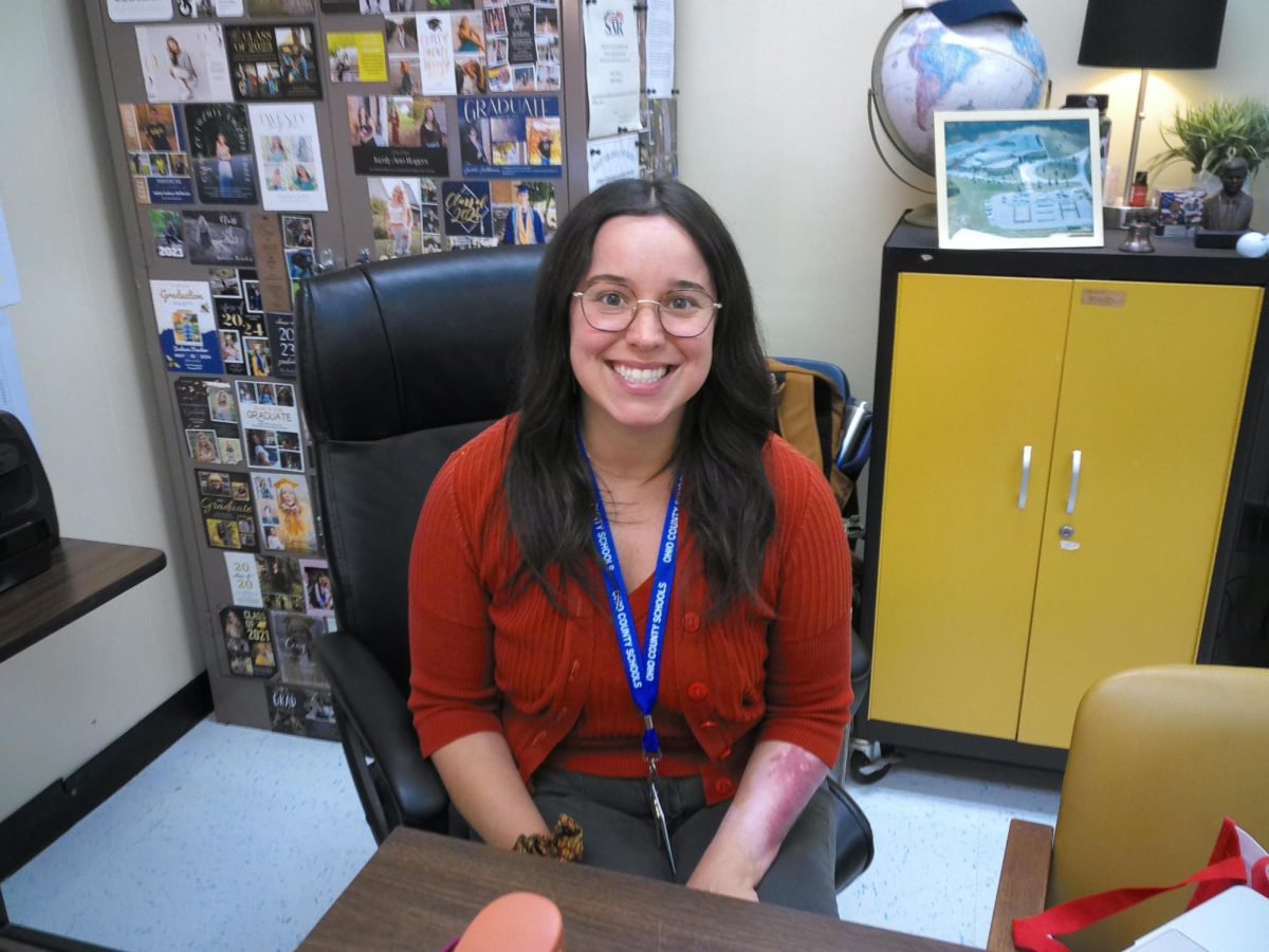 New teacher, Ms.Dobrzynski, gets settled at her desk. 