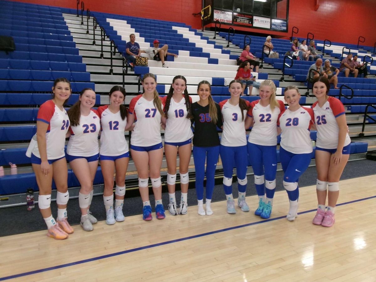 Volleyball poses before a homegame.