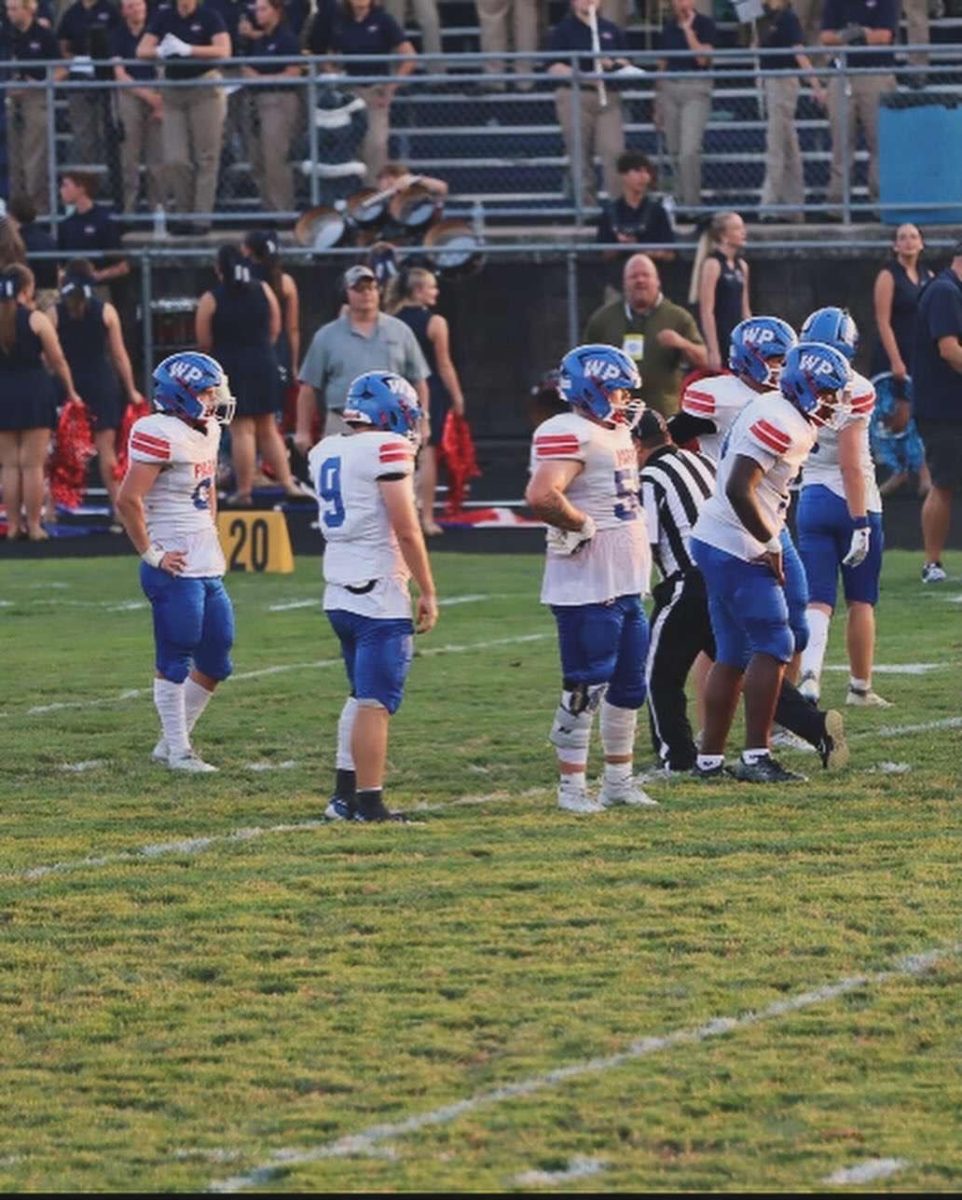 Our boys waiting to get set for the next play. Courtesy of Christian Means