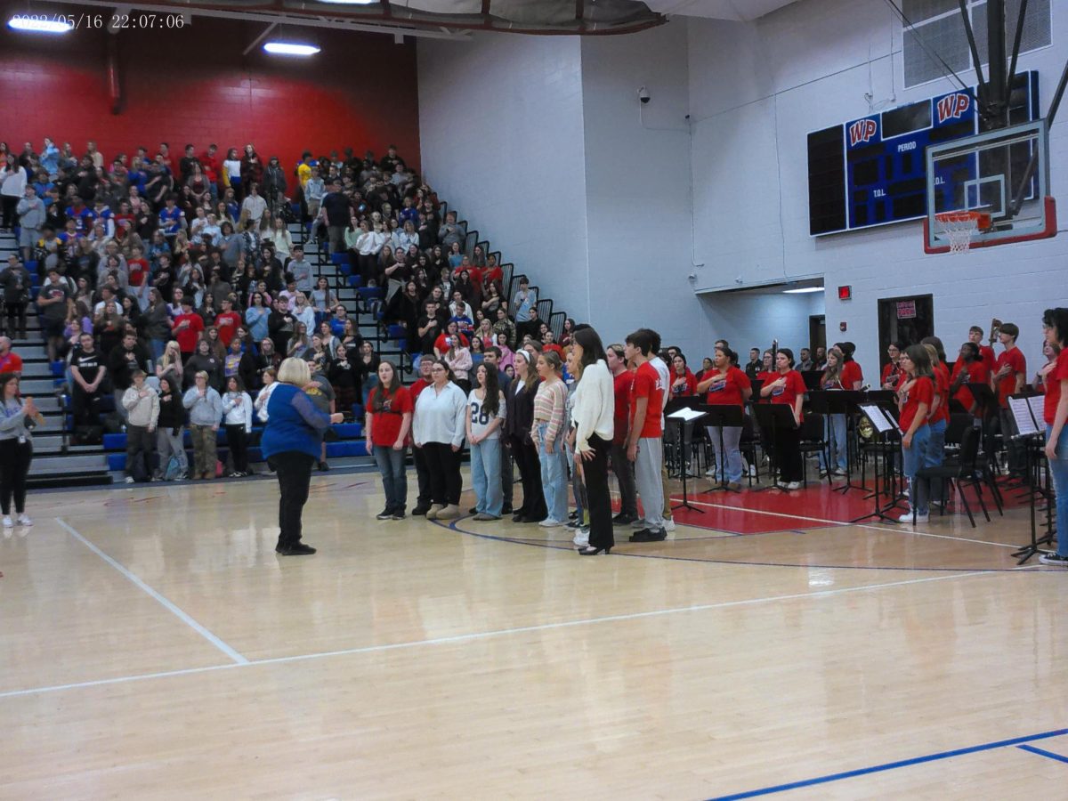 The prestigious Young Patriots open the assembly with the National Anthem.