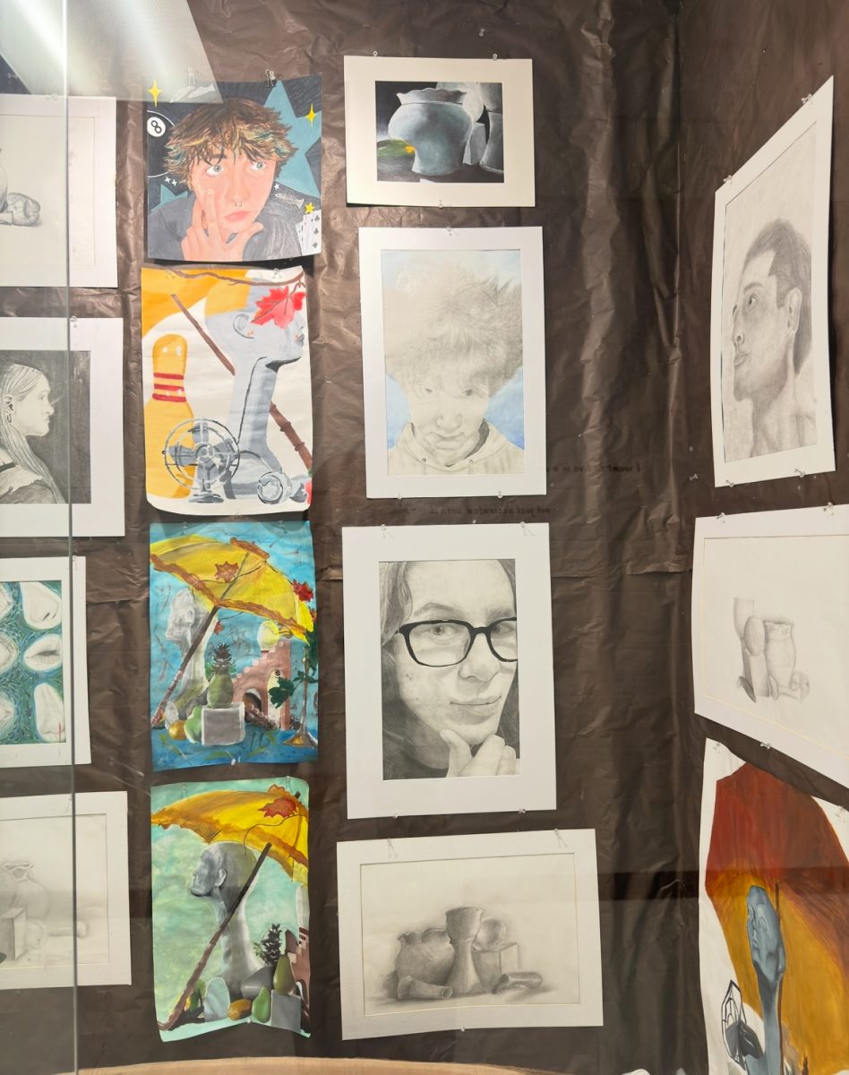 The art display cases feature work from many levels of art classes. 