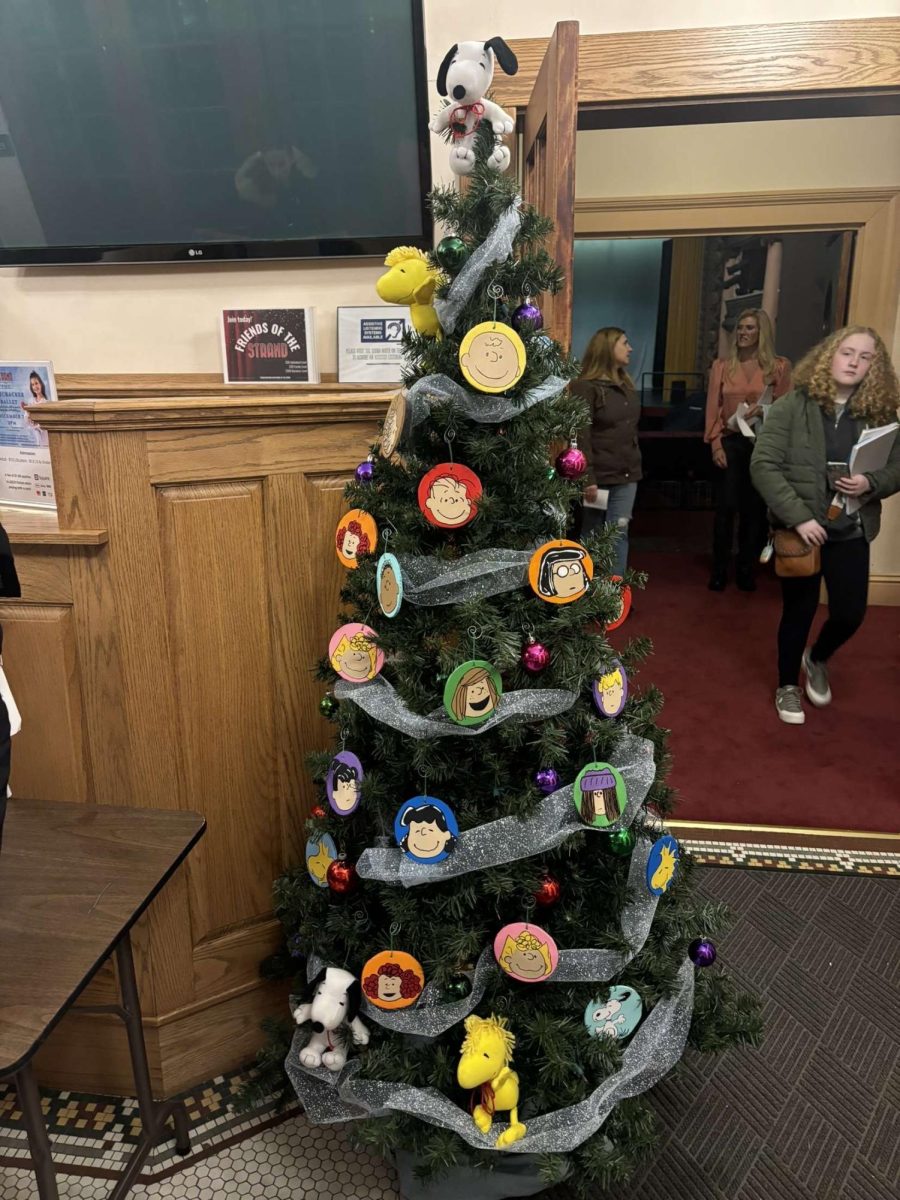 Charlie Brown dons the Christmas Tree in the lobby of The Strand.