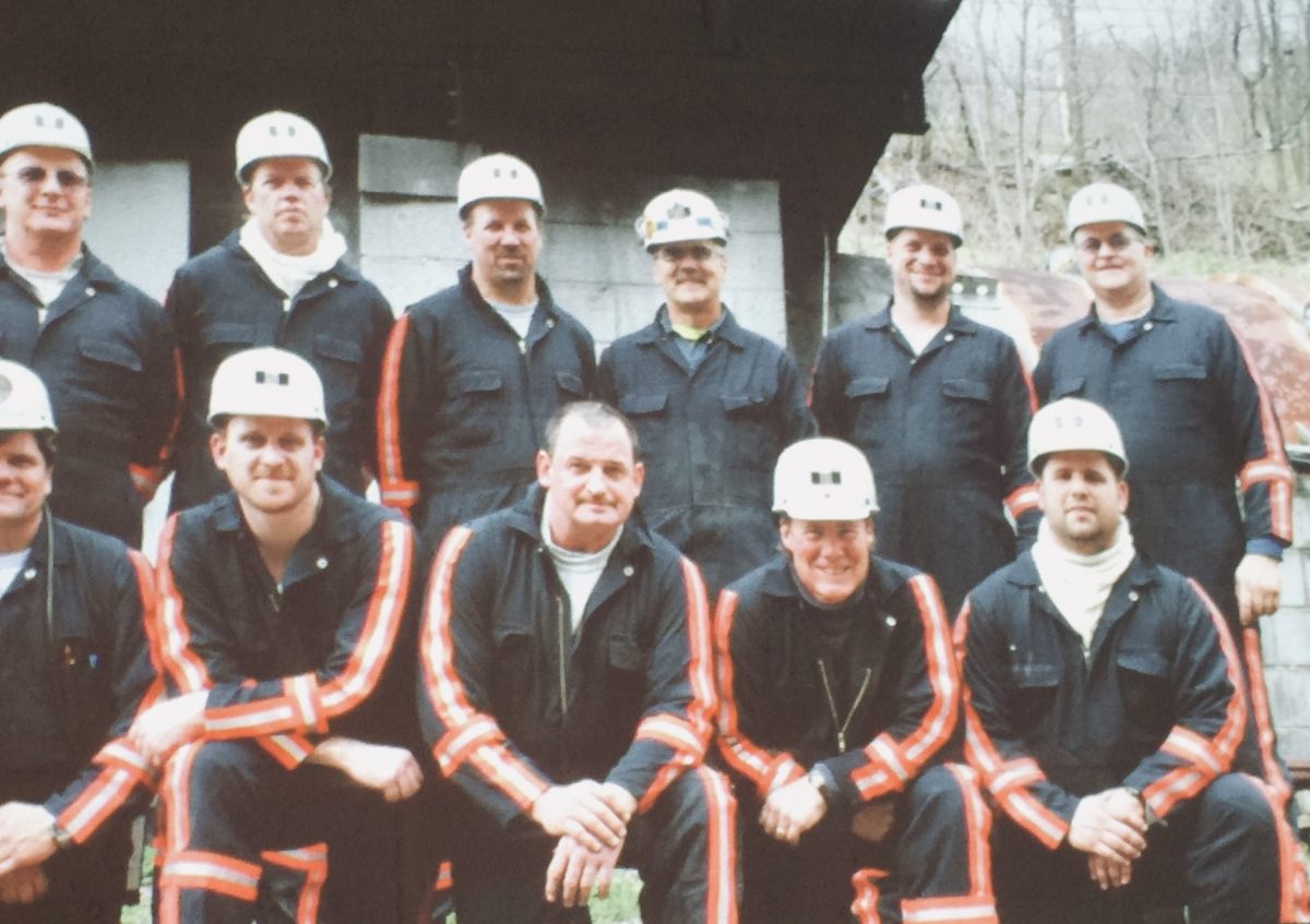 Michael Miskiewicz (first row, far right) and his Mine Rescue team, who are preparing to head deep underground to fight fire. 
(Picture courtesy of Michael Miskiewicz)