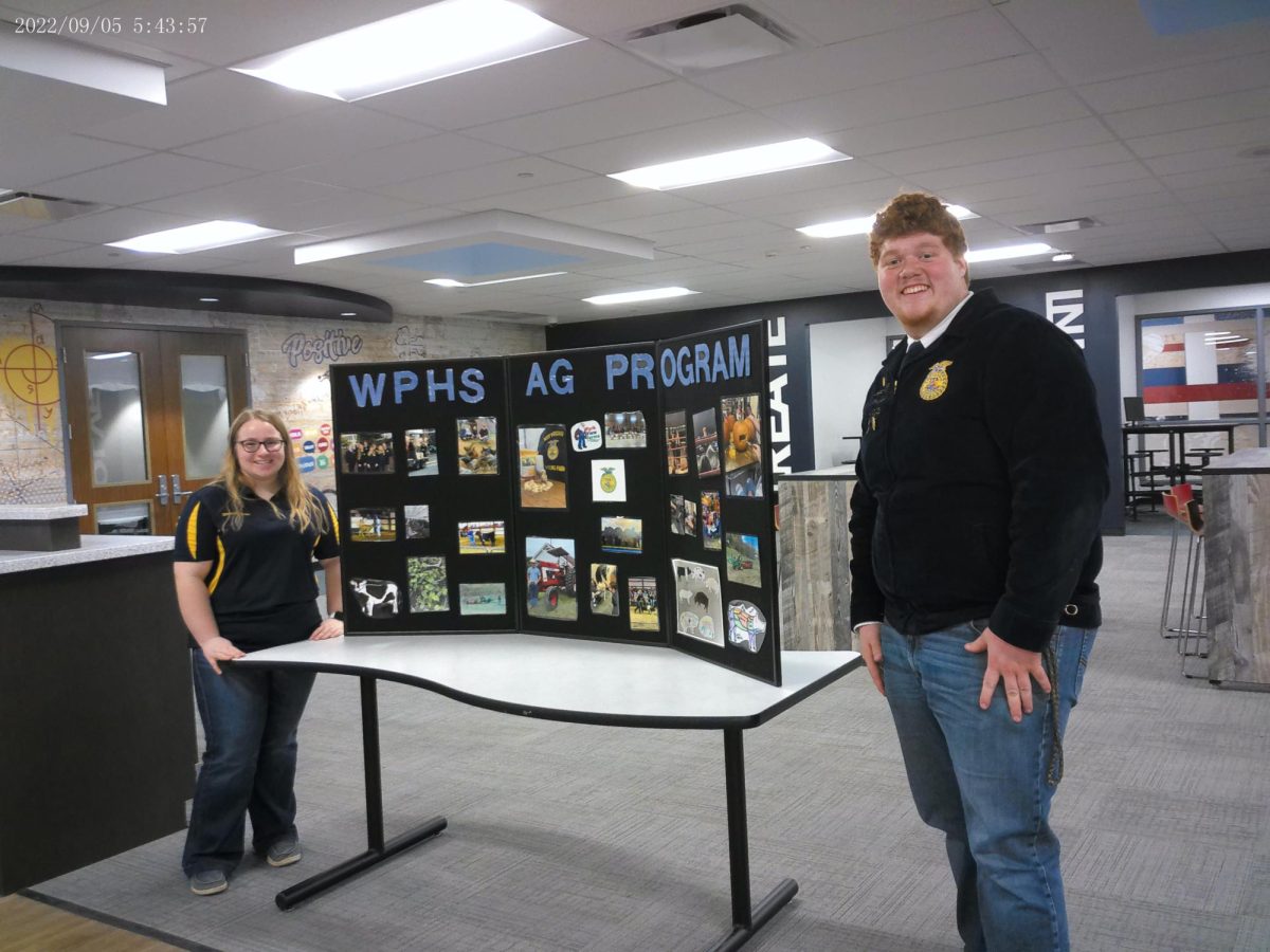 Udderly amazing! Future Farmers of America members, Emma Mcnickle and Japeth Bayes, rep our Agriculture Program. 