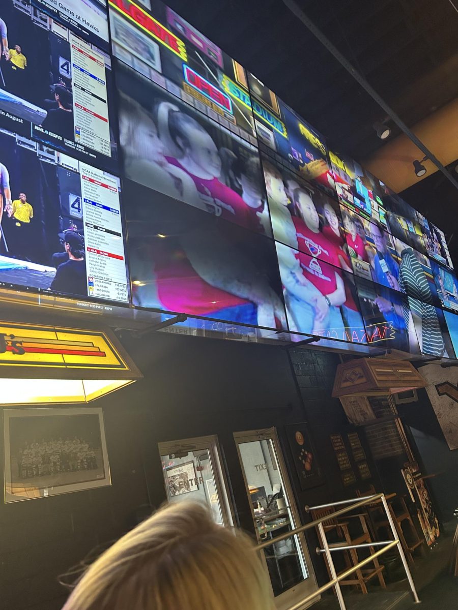 Just moments after filming, the team's interview is aired on the jumbo TV's in the restaurant, making for a proud moment. 