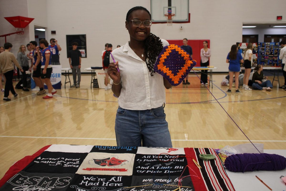 Anisa Loving represents the tight-knit Knittie Bitties. 