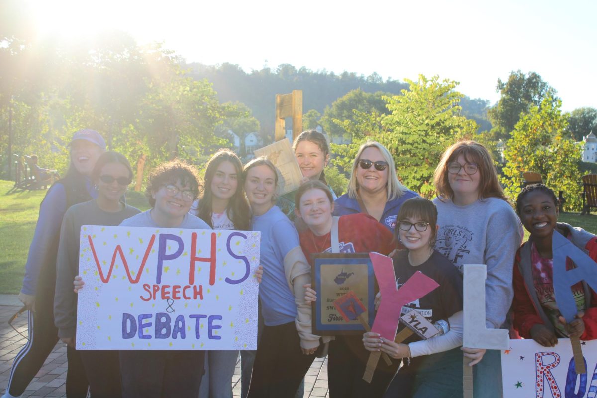 Speech and Debate and YLA team up in their celebration.