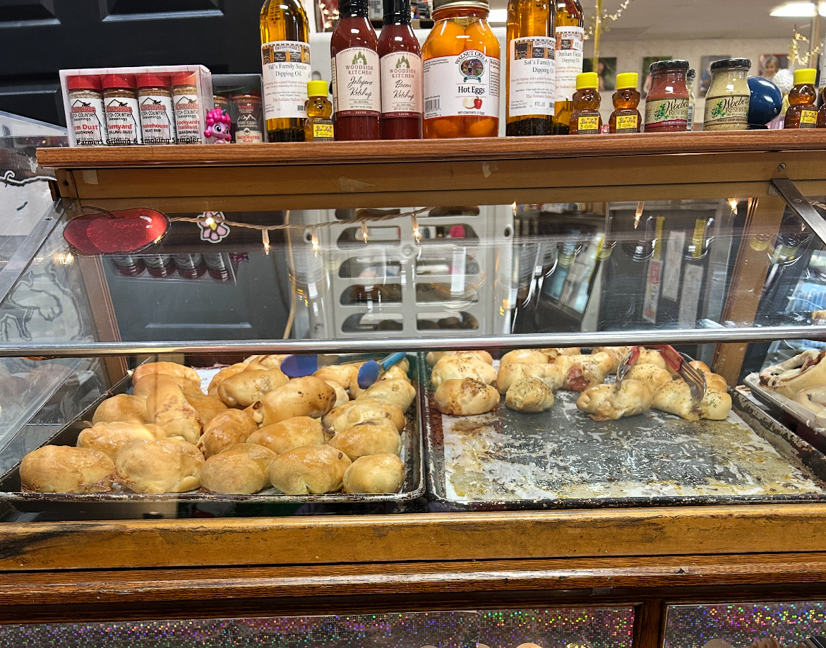 The famous pepperoni roll counter is just one small part of the amazing sweets and delights around The Fat Apple.