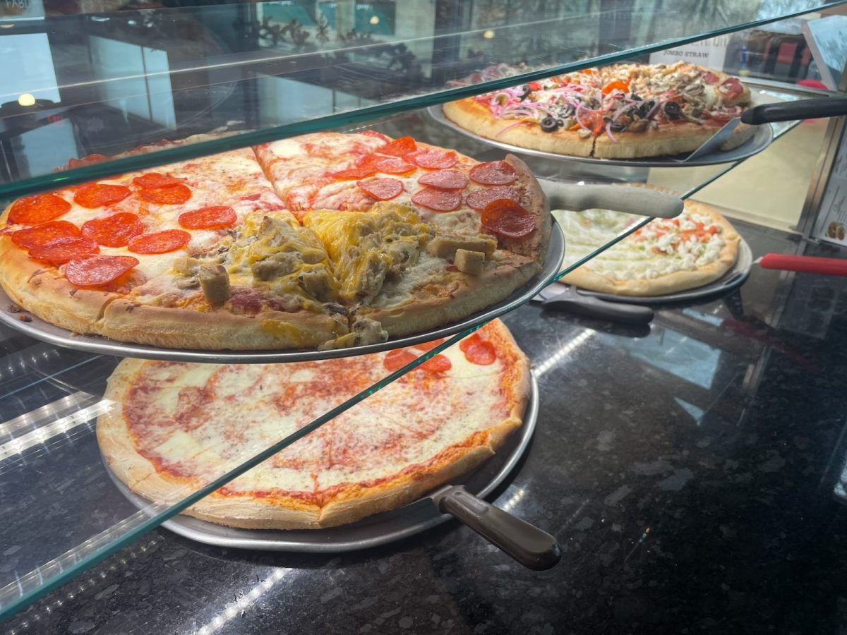 Warm pies fill the counter in the new Main St. location of Fabio's in downtown Wheeling.