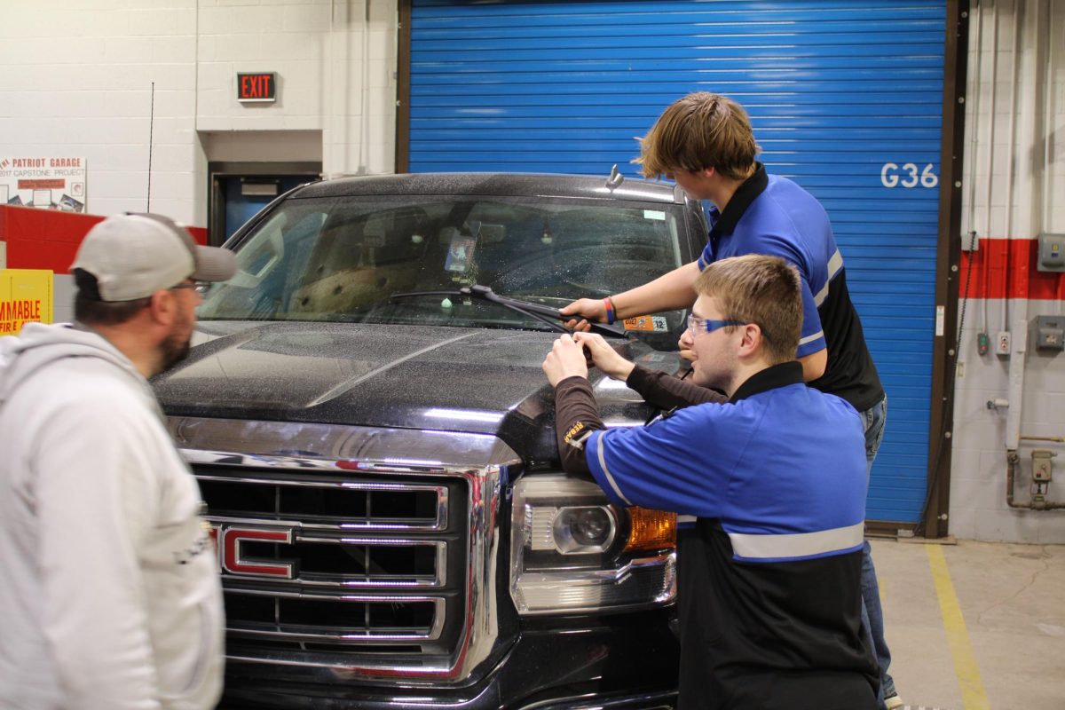 First year automotive technology students work on vehicle repairs. 