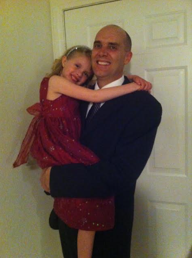 Mael Glennon holding his daughter Alexandra Glennon before a daddy-daughter dance. Courtesy of Denise Glennon. 