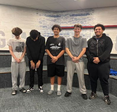 Stevie3x (pictured in the middle) is an aspiring rapper at Wheeling Park High School surrounded by his entourage.