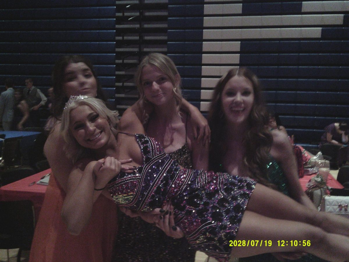 Ella, Kayley, Addison, and Tori at homecoming. 