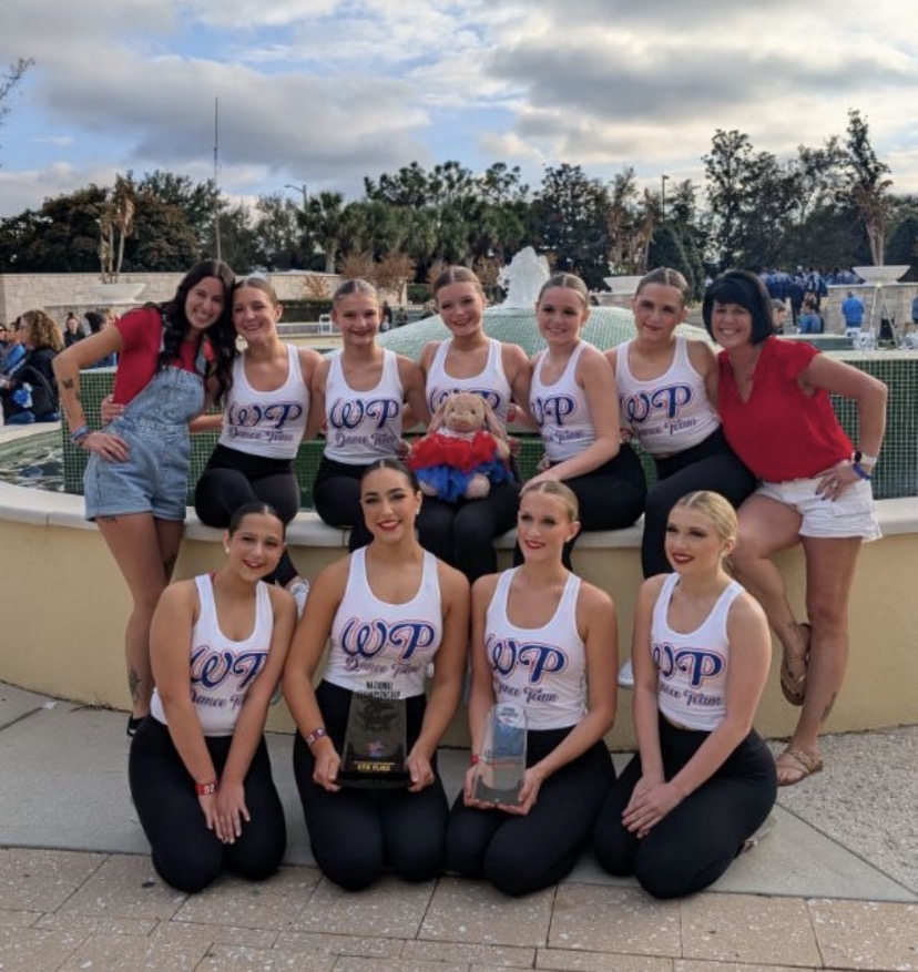 The Wheeling Park Dance Team posing with their three awards they won at the 2026 National Competition (Provided by Stefanie Maroney). 