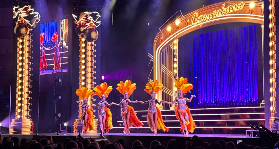 All female DWTS professionals taking the stage for a showgirl themed routine.