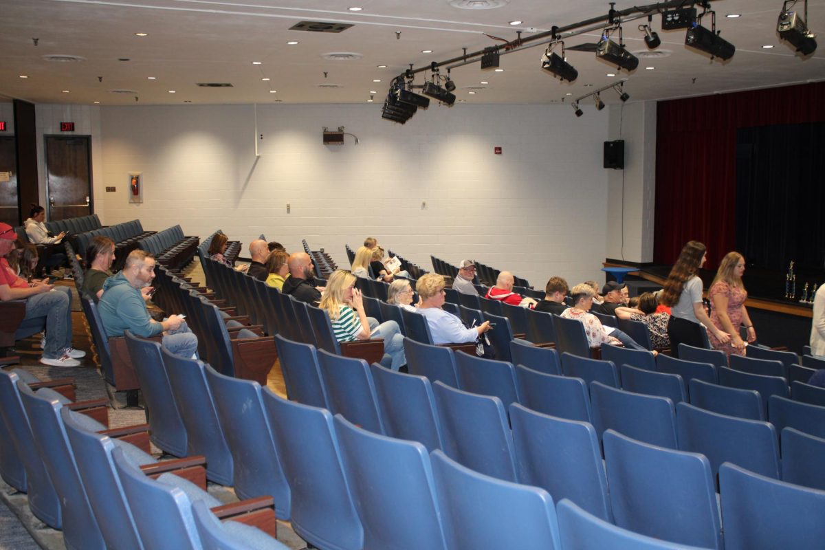 Family and friends gather in the Beneke to celebrate the Speech & Debate team.