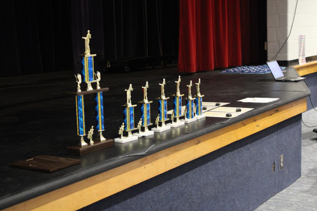 Trophies stand ready for their recipients. 