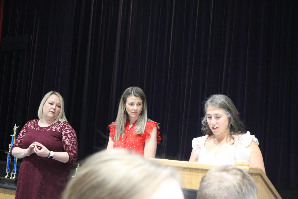 Coaches present awards to deserving students. 
