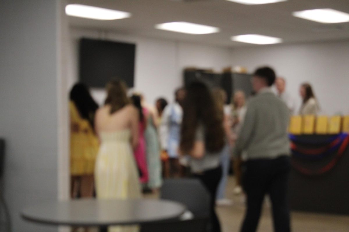 Family and friends gather in the Patriot Point for desserts and refreshments. 