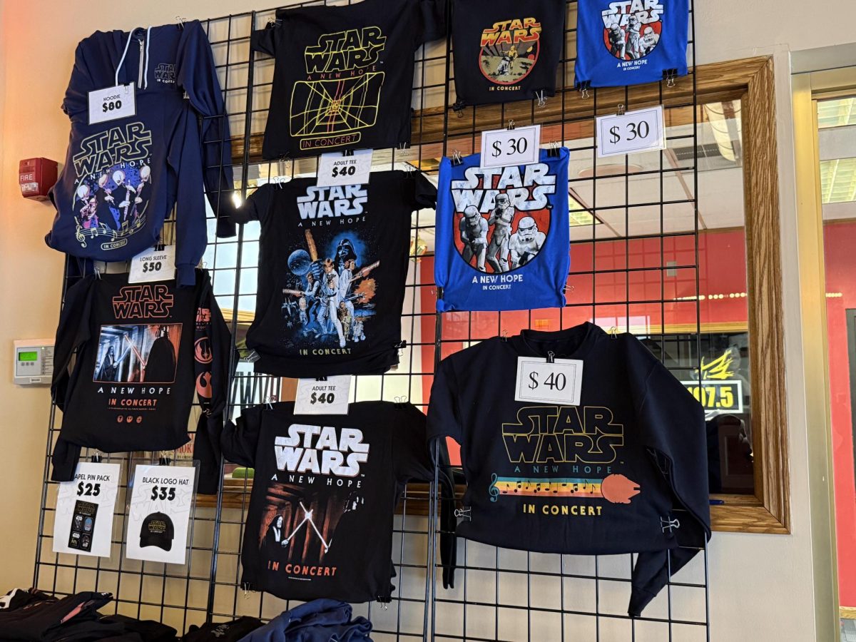 It wouldn't be a show without merchandise. The Lobby of the Theatre has a makeshift wall decked with Star Wars t-shirts, hoodies, hats, etc.