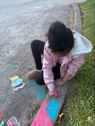 Cali is bringing the pavement to life with vibrant chalk art.